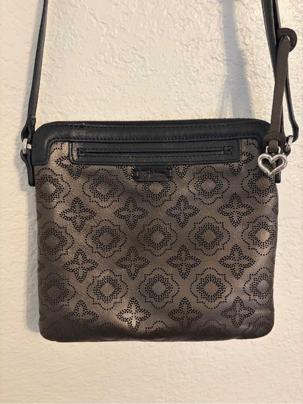 Brighton Brown and Black Perforated Crossbody with Heart Charm